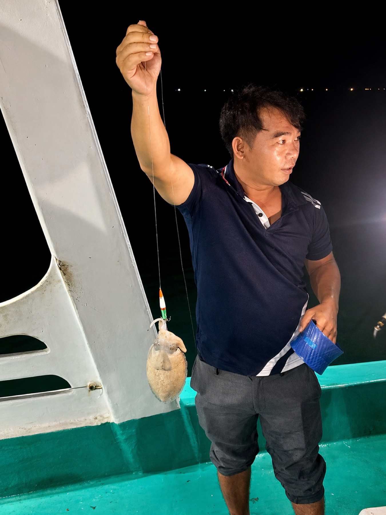 Squid fishing boat at sunset off Phu Quoc